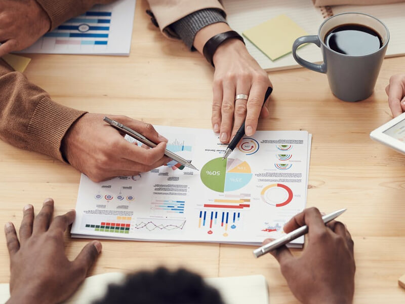 Team collaborating on digital marketing strategies at Envision Your Business